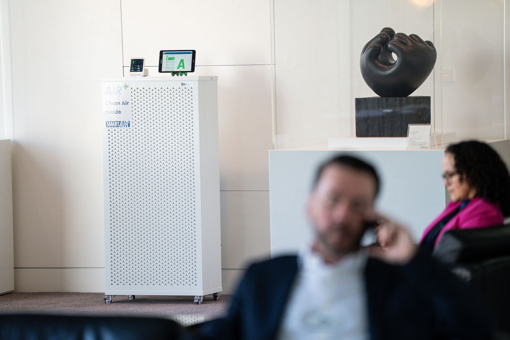 Smart Air’s Blast air purifier operating alongside AirSense real-time air quality monitoring.